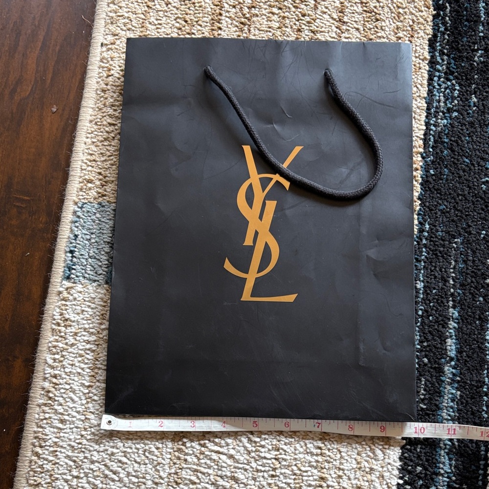 Yves Saint Laurent Black Bag with Gold Logo